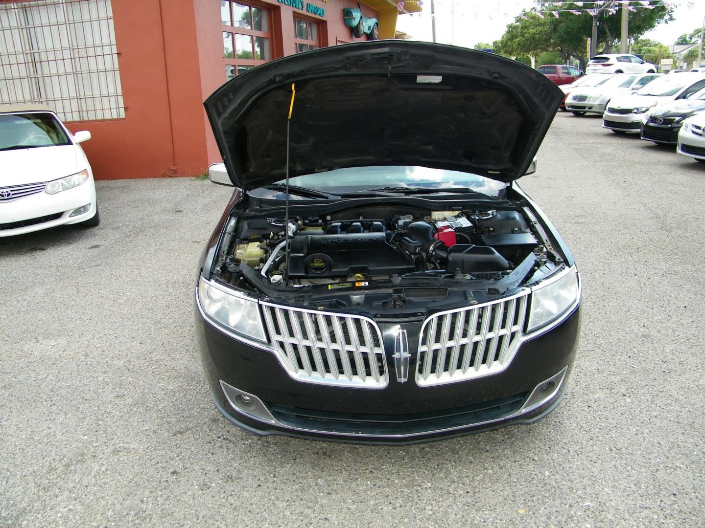 2011 Black /Black Lincoln MKZ FWD (3LNHL2GC0BR) with an 3.5L V6 DOHC 24V engine, 6-Speed Automatic transmission, located at 4000 Bee Ridge Road, Sarasota, FL, 34233, (941) 926-0300, 27.298664, -82.489151 - Photo#9